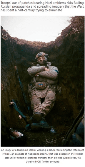 ukrainian soldier with totenkopf patch sleeping